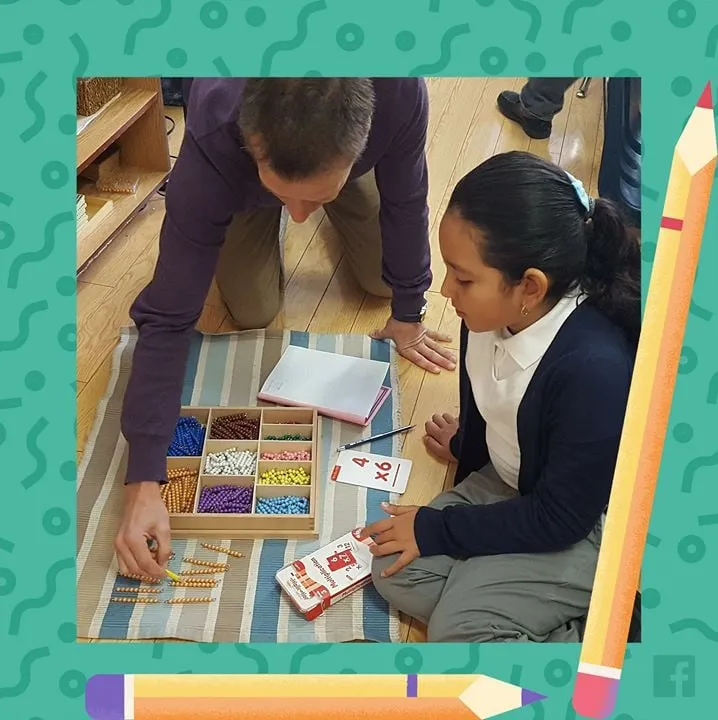 A teacher and an older student working through multiplication with the bead materials